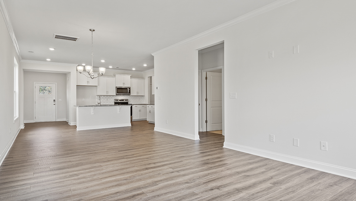 Family room with large windows, open concept