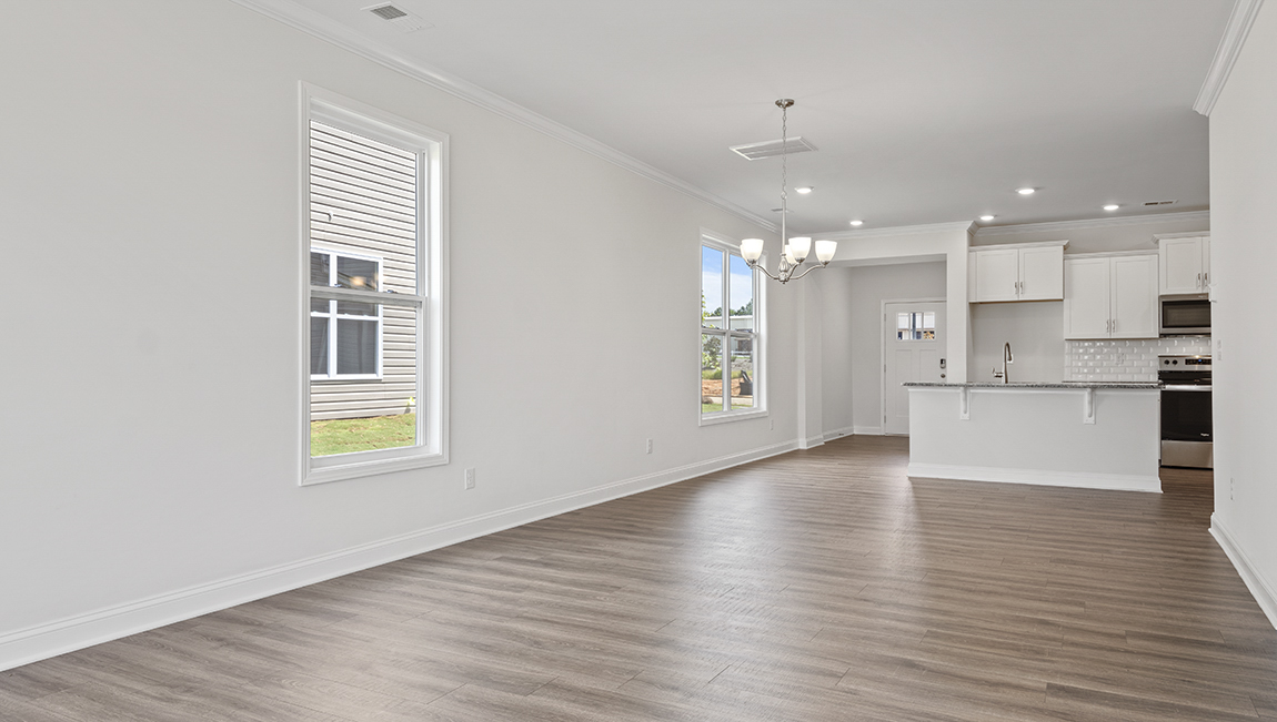 Family room with large windows, open concept