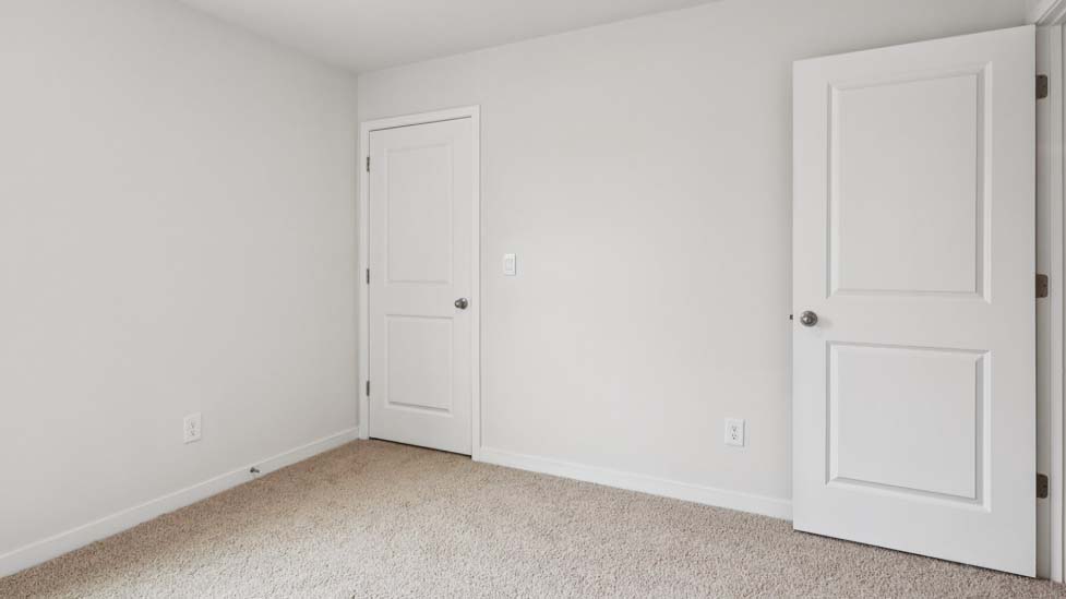 Carpeted bedroom