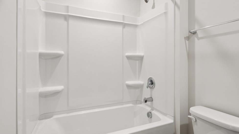 Bathroom with bathtub shower combo