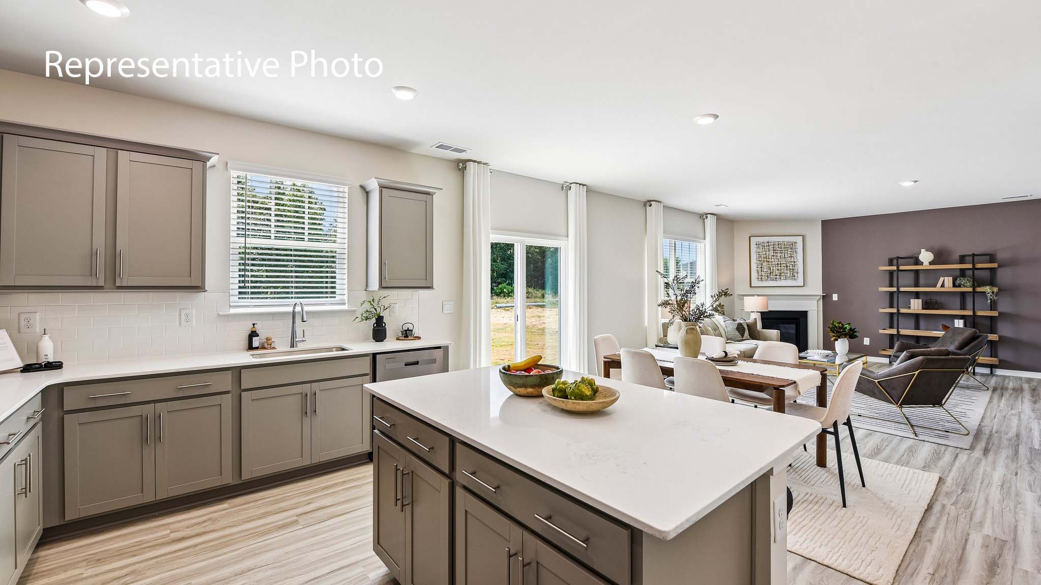 kitchen and island with stainless steel appliances