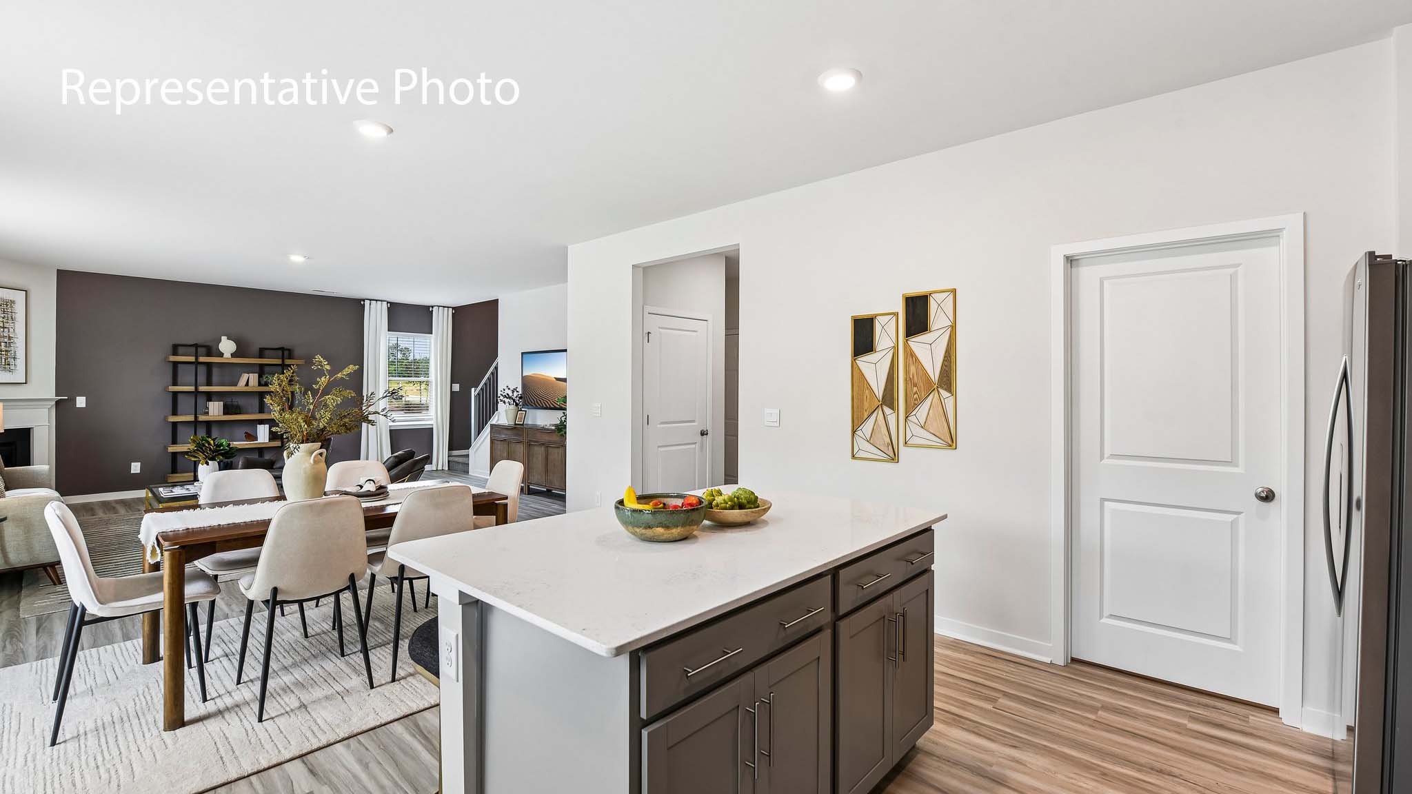 kitchen and island with stainless steel appliances