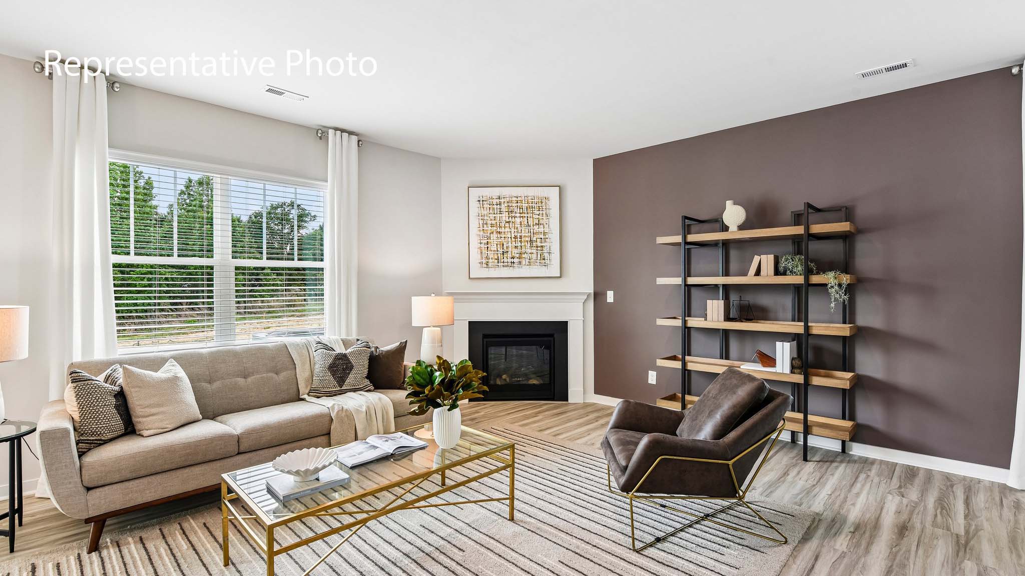 living room with fireplace and large window