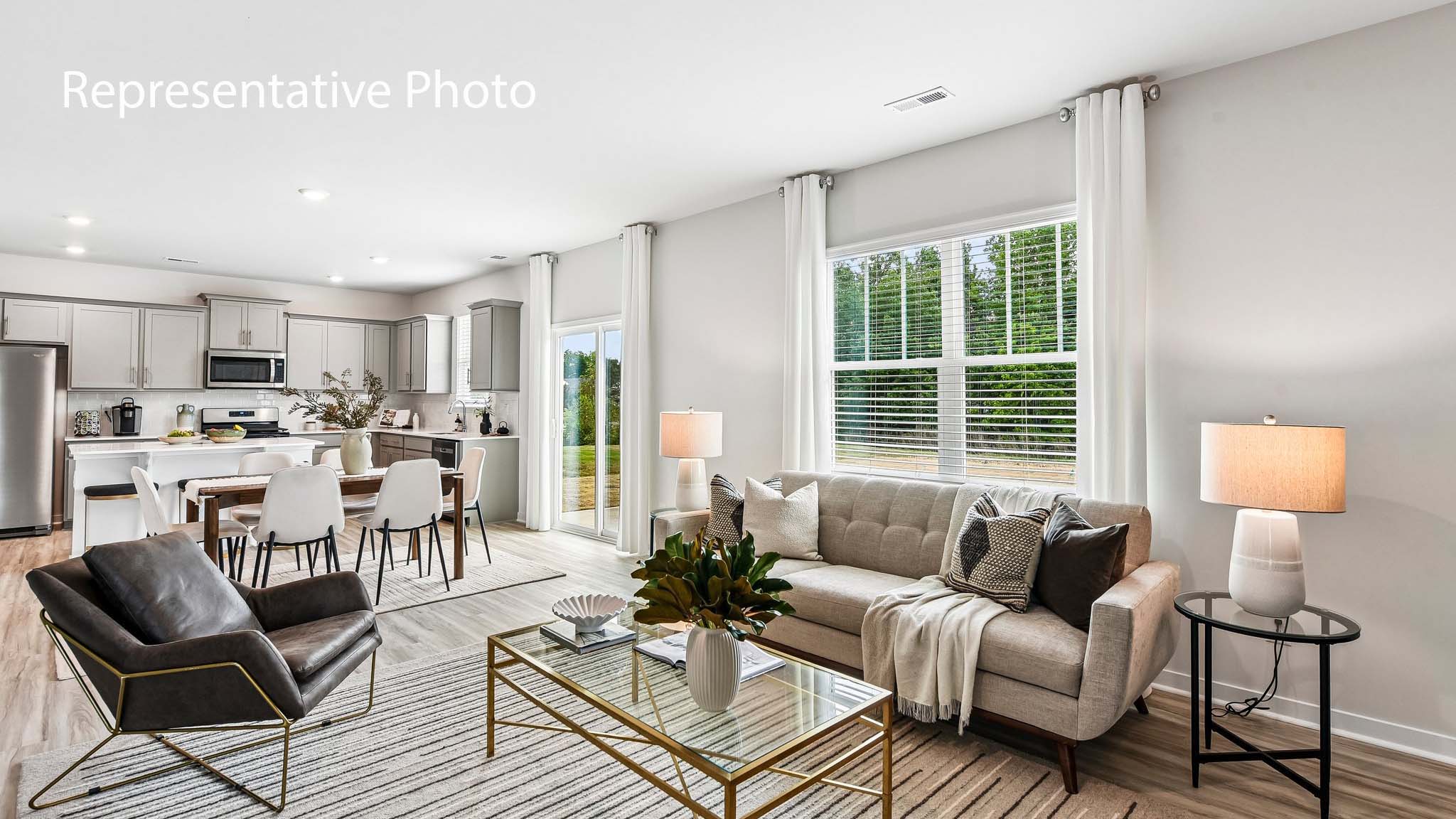 living room with fireplace and large window