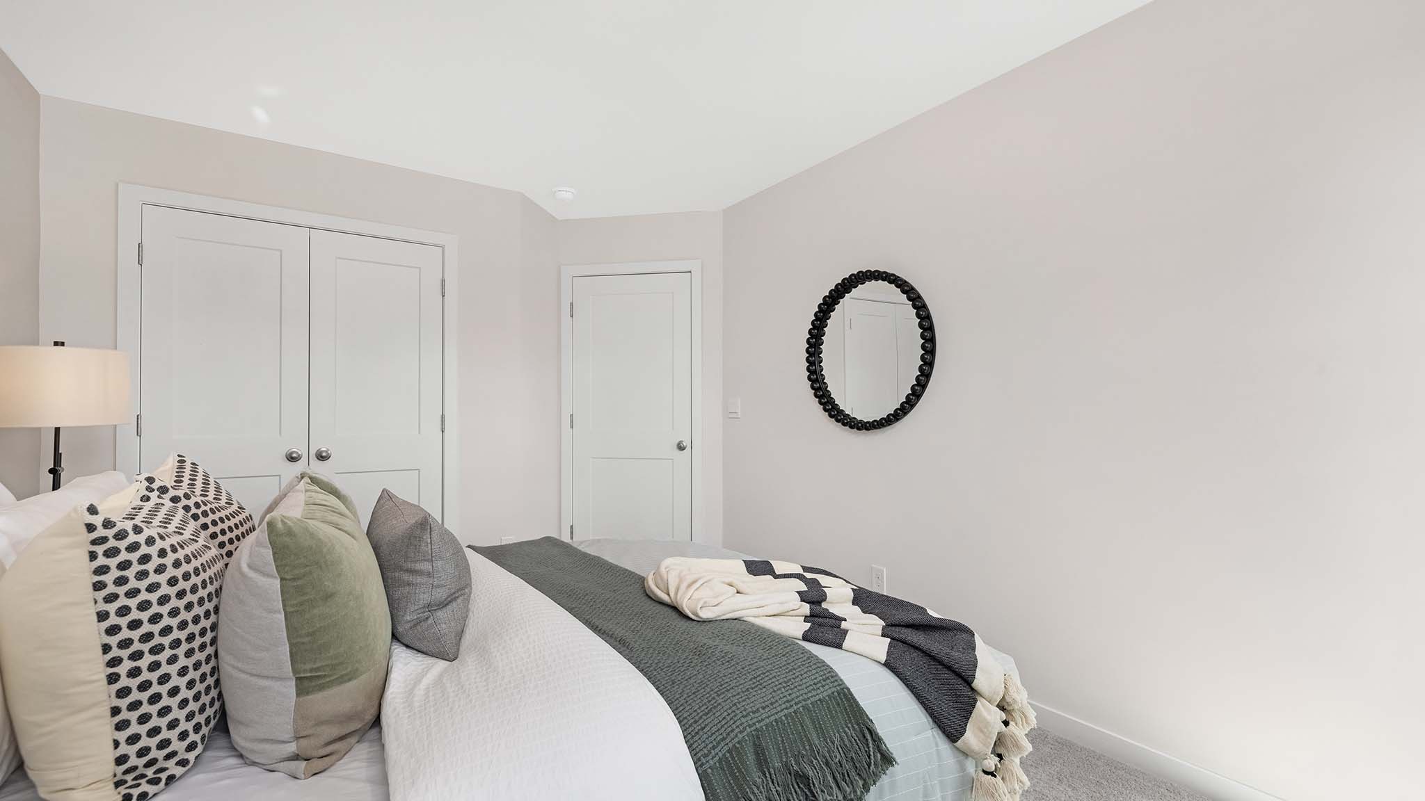 Bedroom with carpet and windows