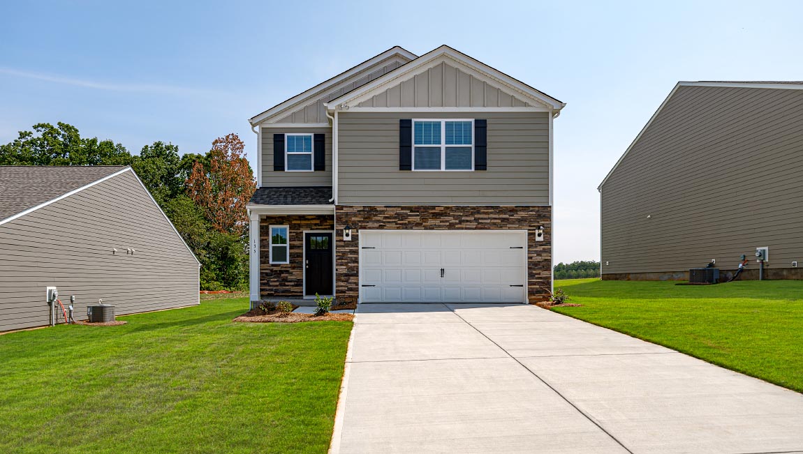 Darwin front exterior with siding and two car garage