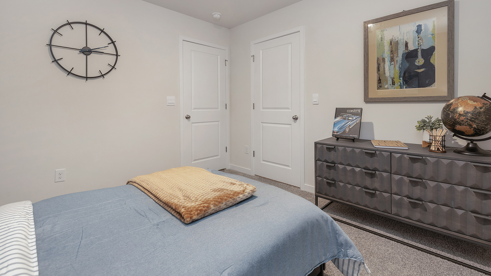 Carpeted bedroom  with small window