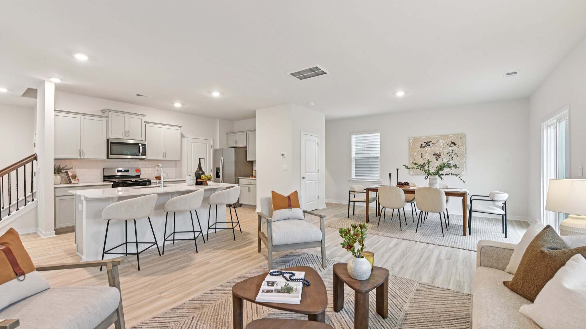 Spacious family room with windows and fireplace