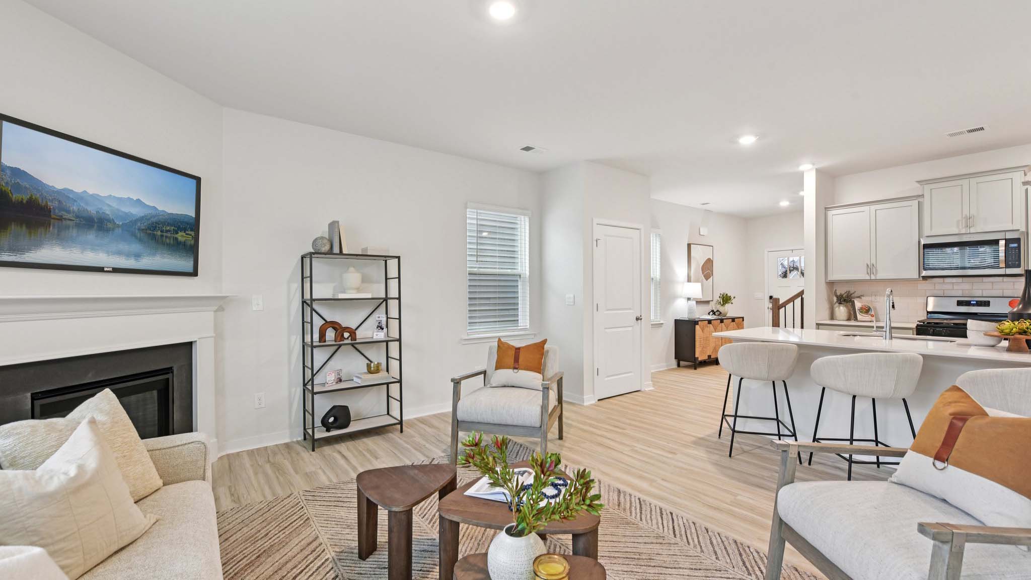 Spacious family room with windows and fireplace