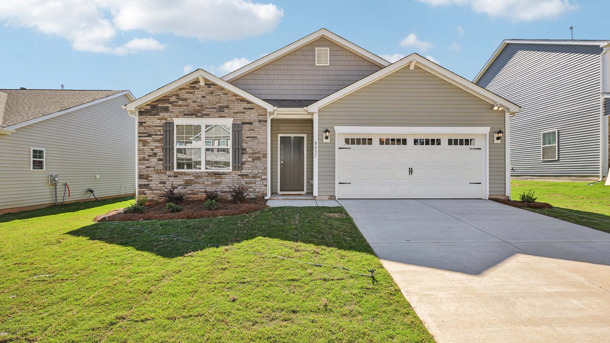 Cali front exterior with two car garage