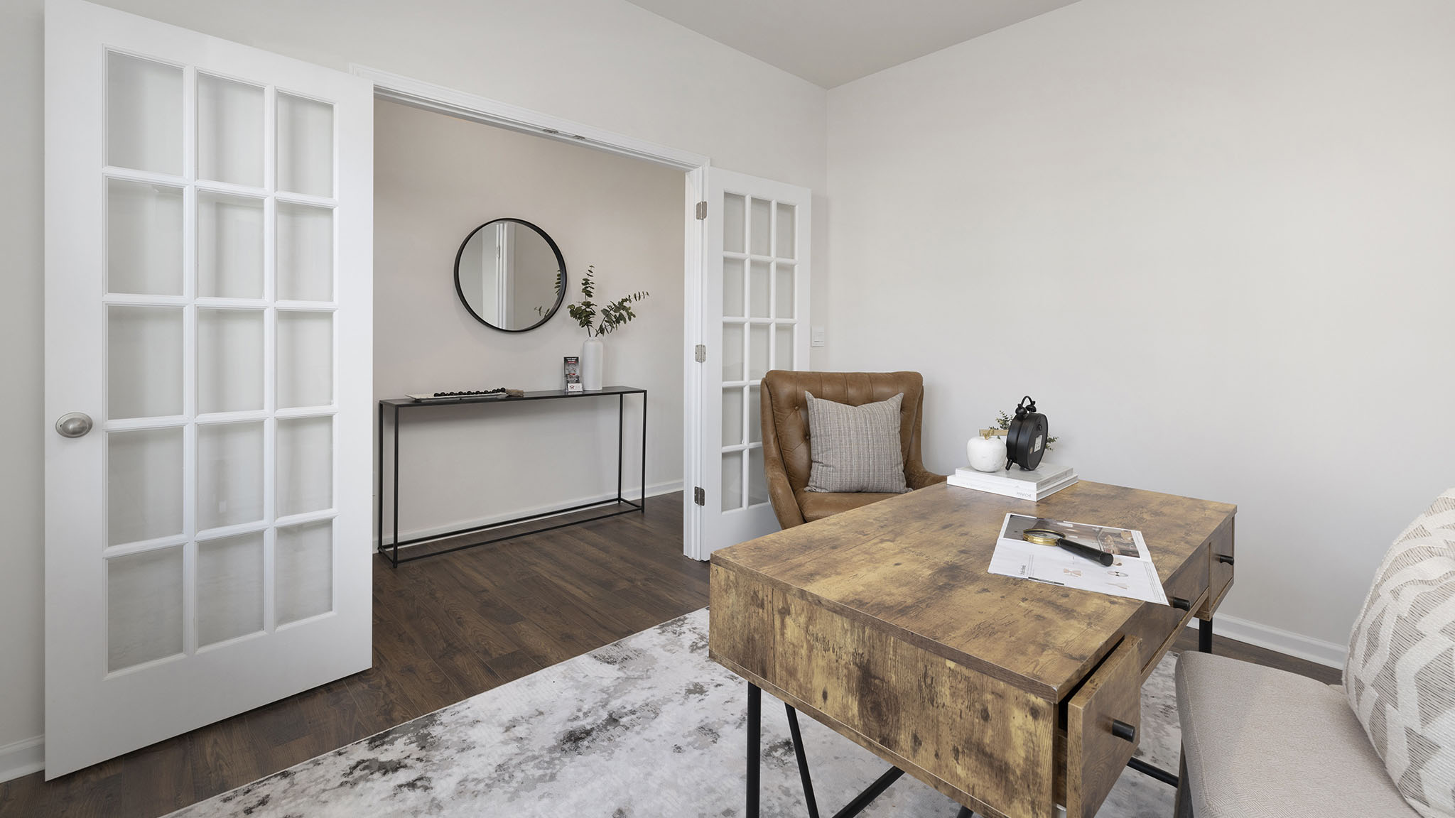 carpeted bedroom with windows
