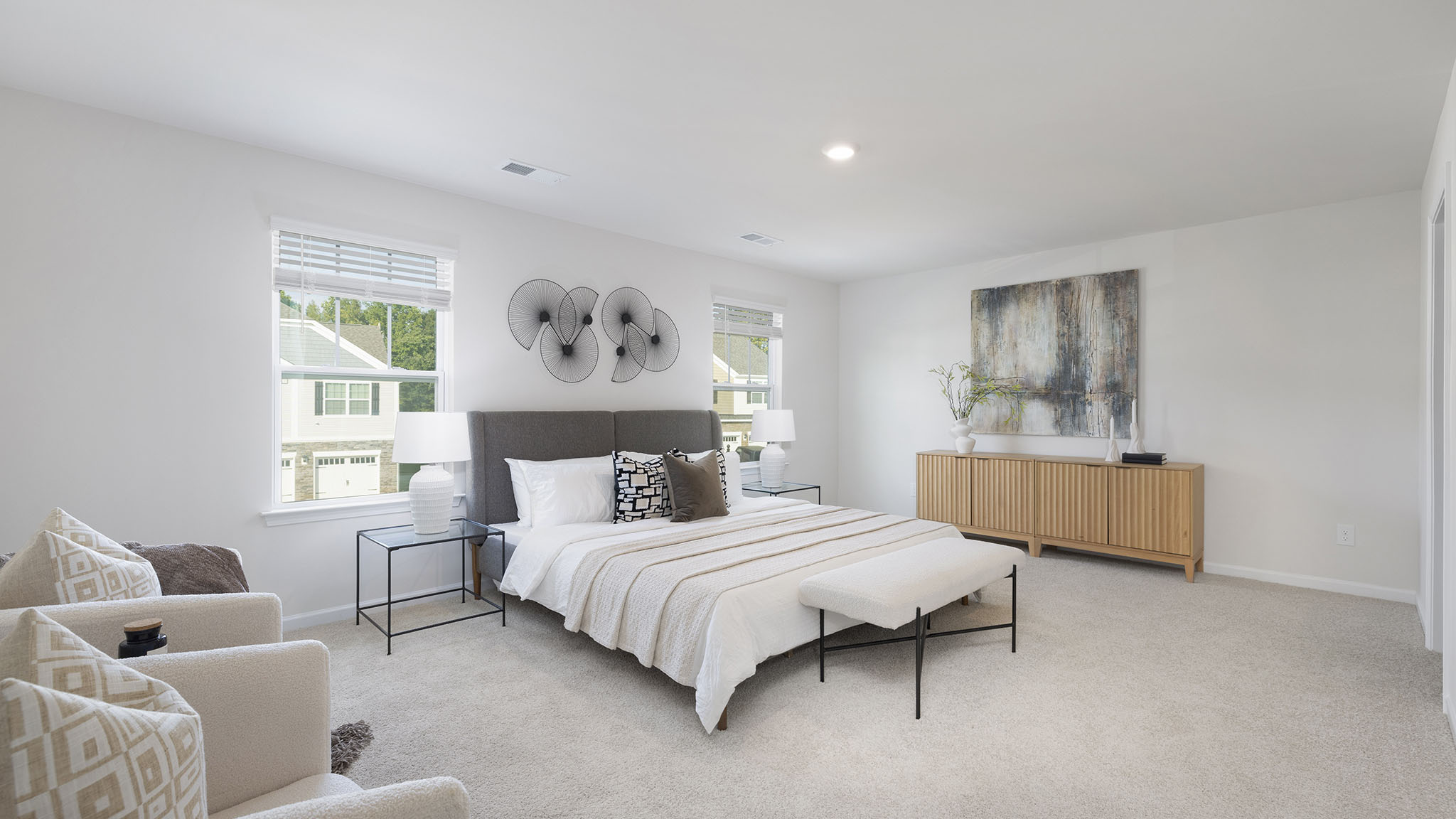 Primary bedroom with windows