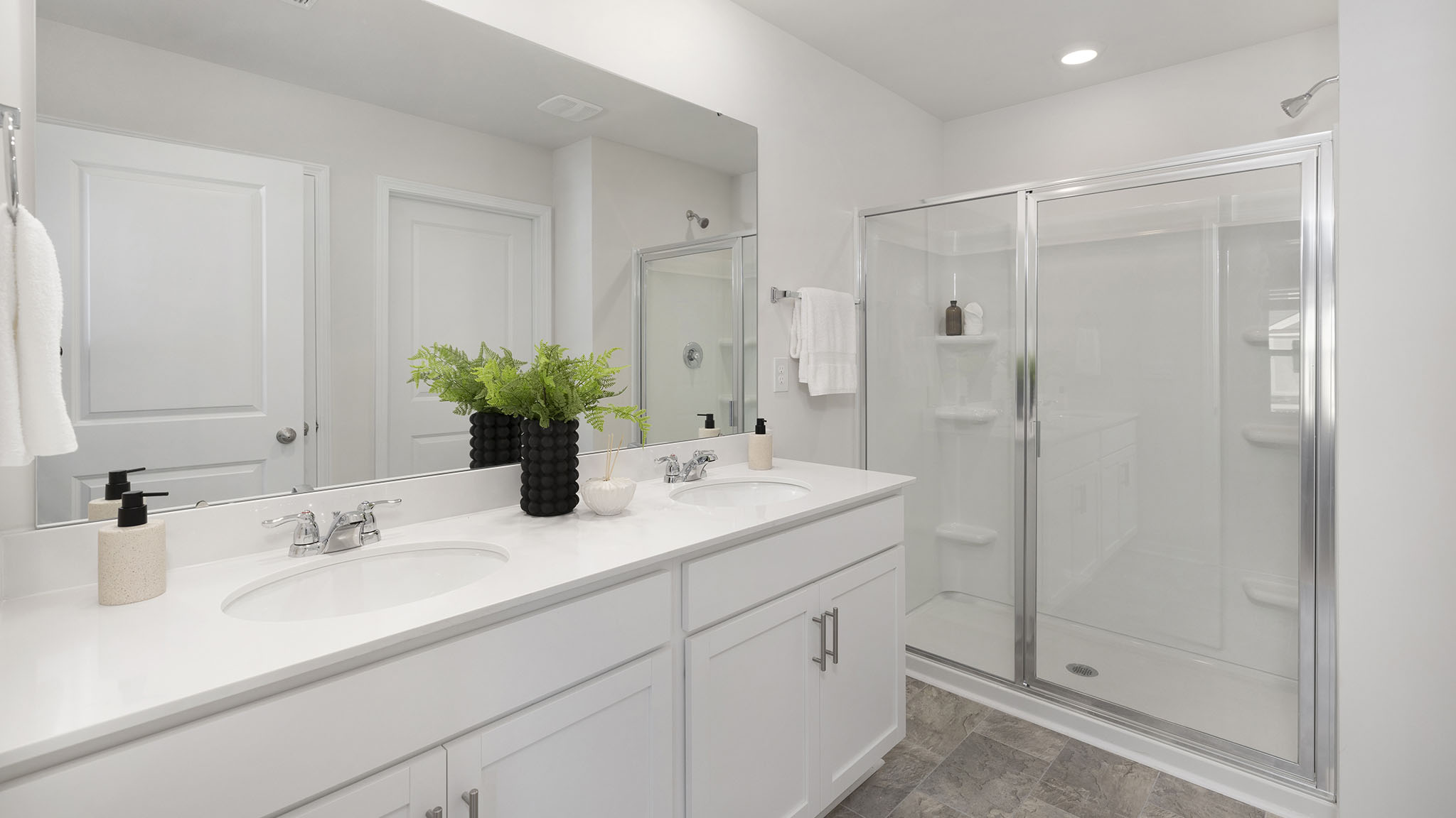 Primary bathroom with standing glass shower
