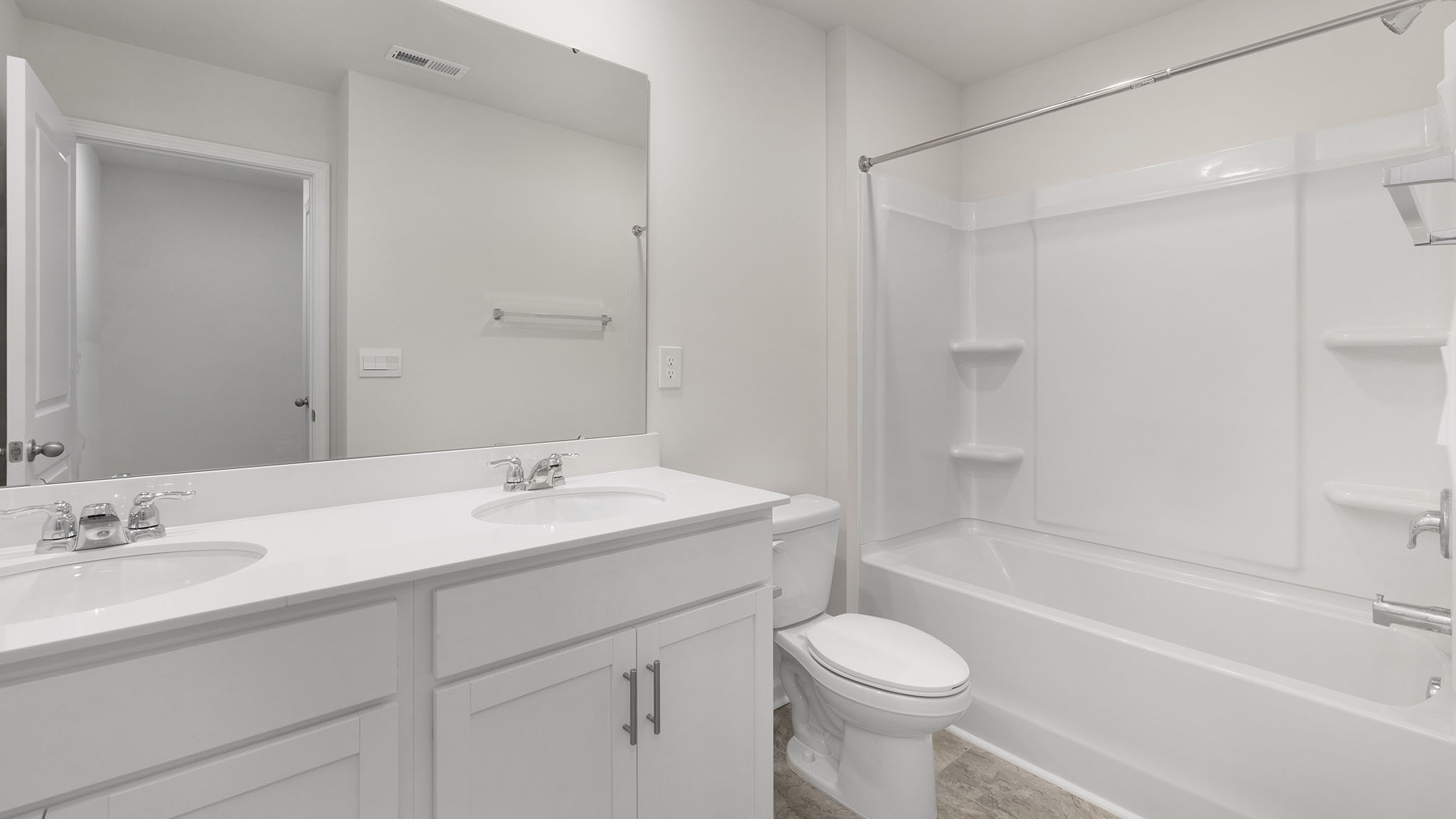 bathroom with tub and shower