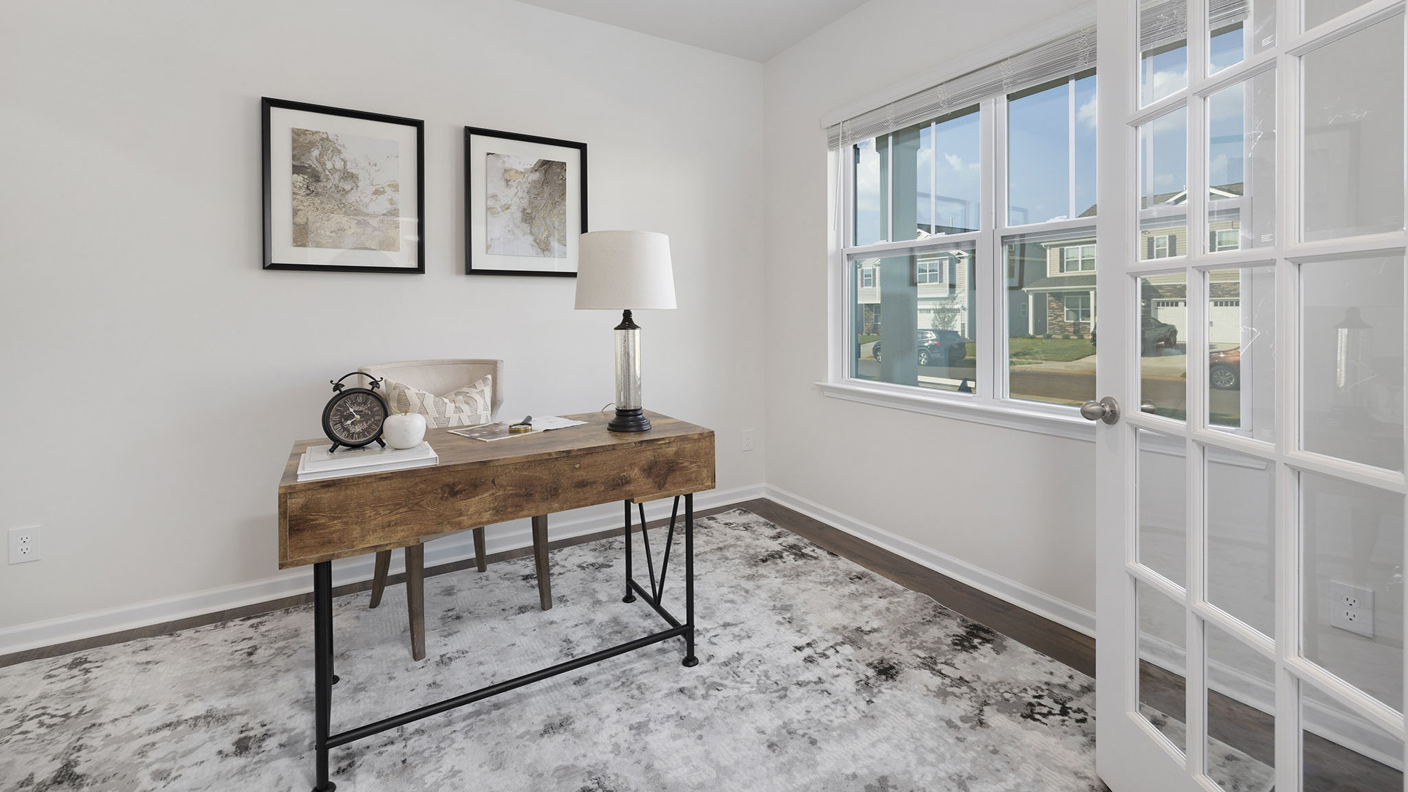 carpeted bedroom with windows