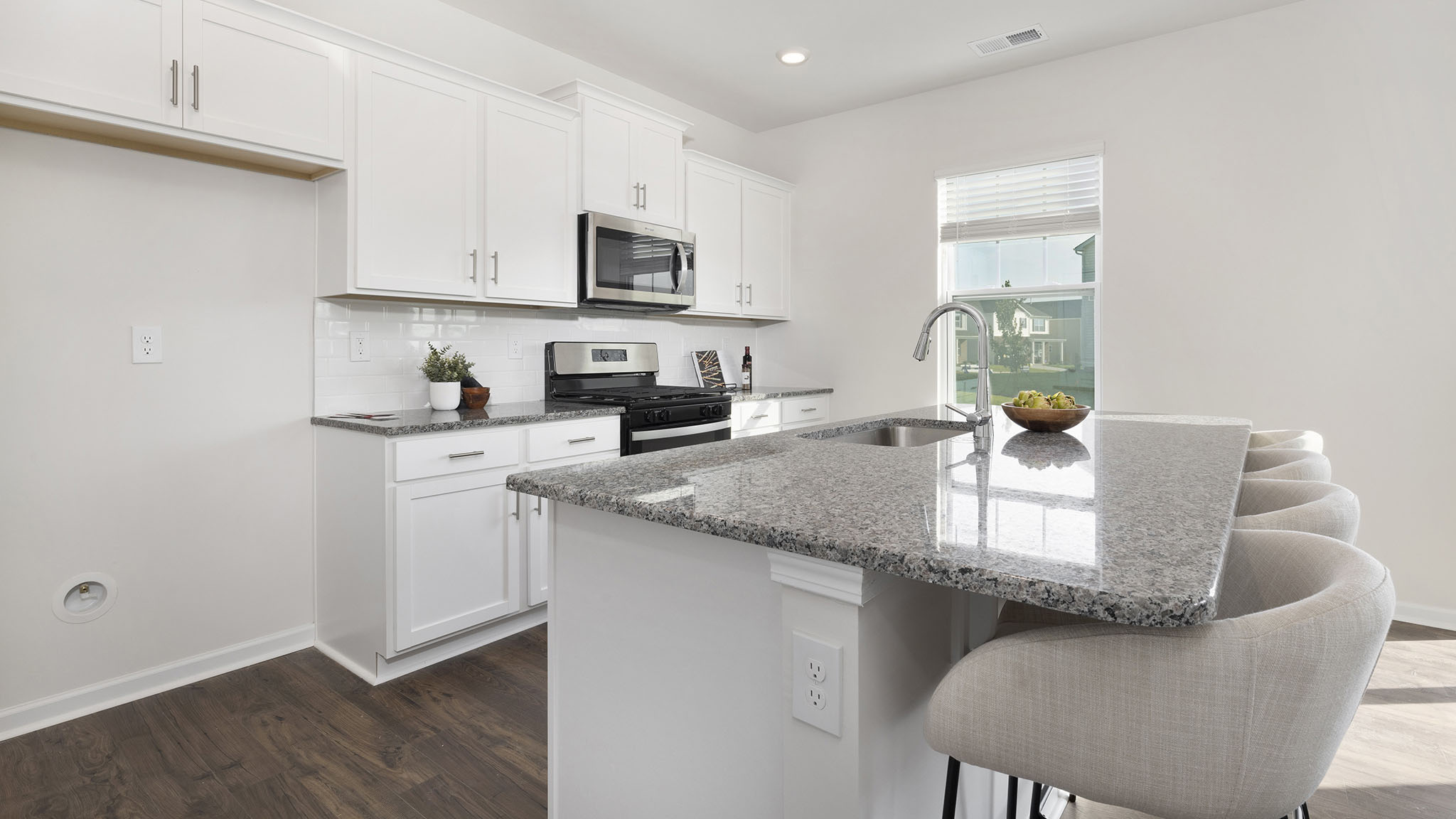 Kitchen and Island with stainless steel appliances