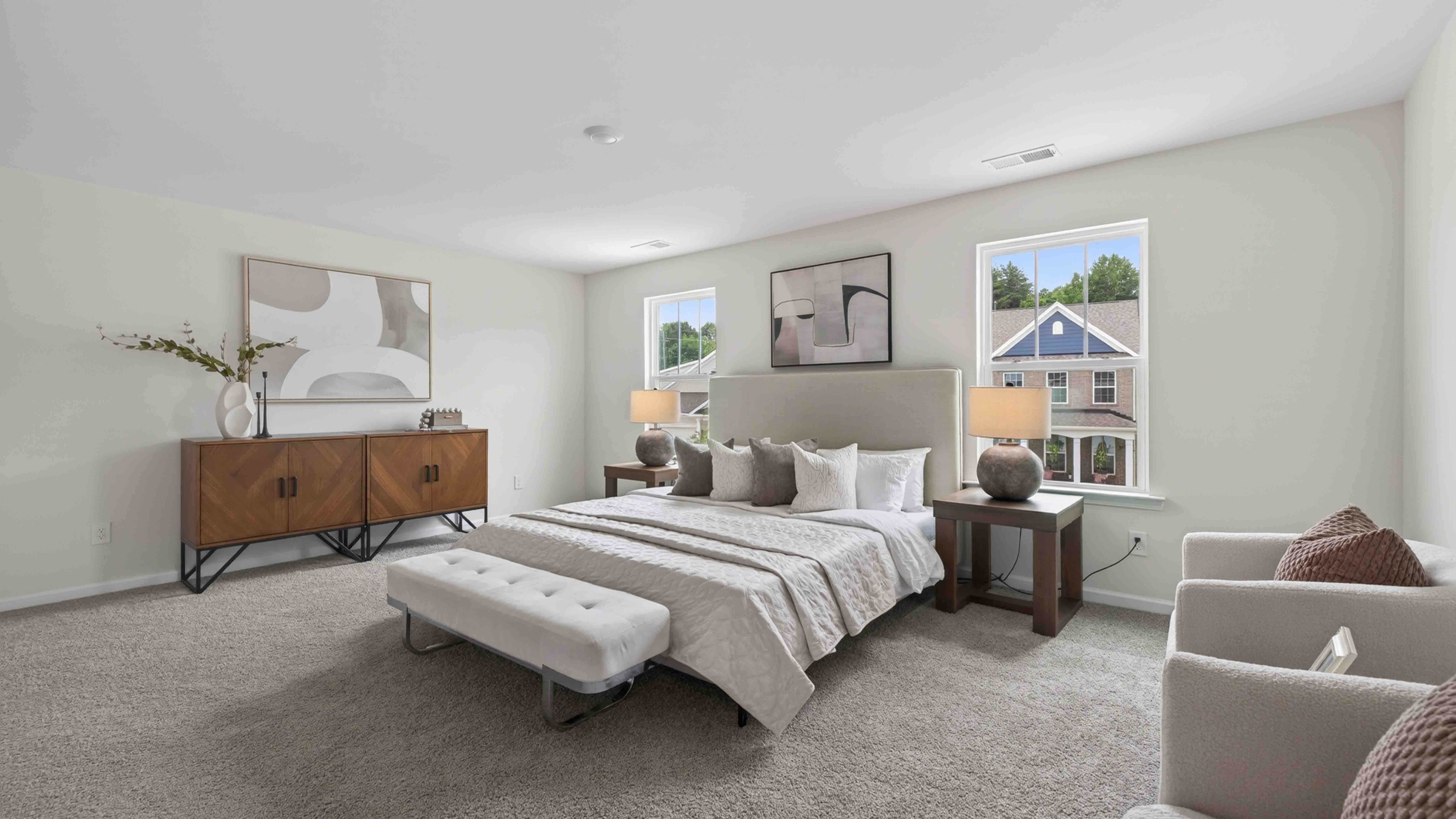 primary bedroom with windows