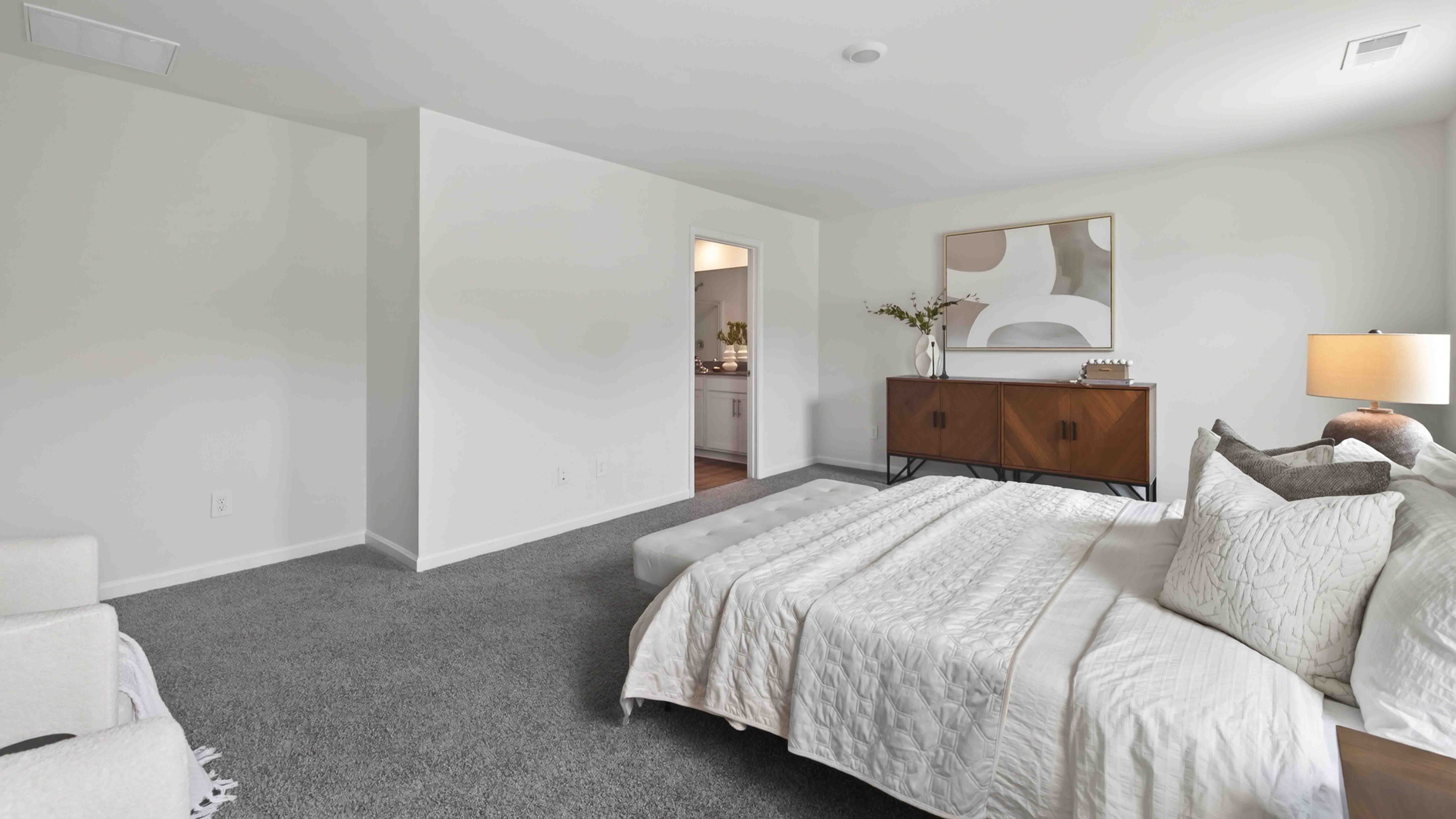 primary bedroom with windows