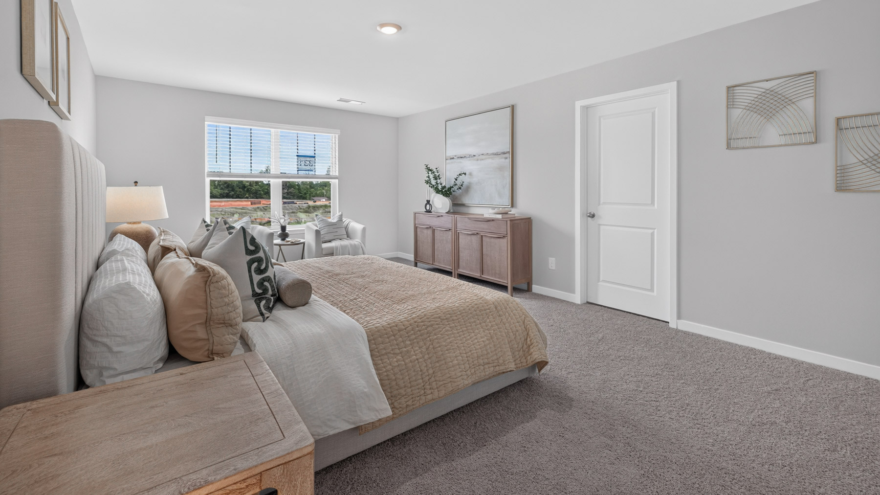 primary bedroom with windows