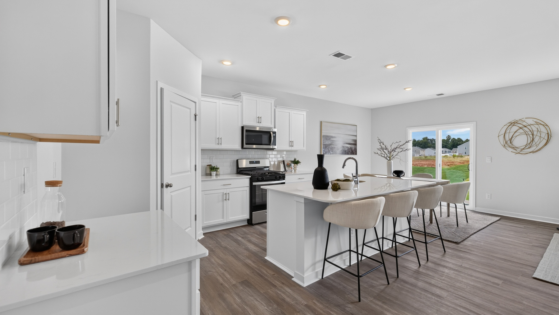 kitchen and island with stainless steel appliances