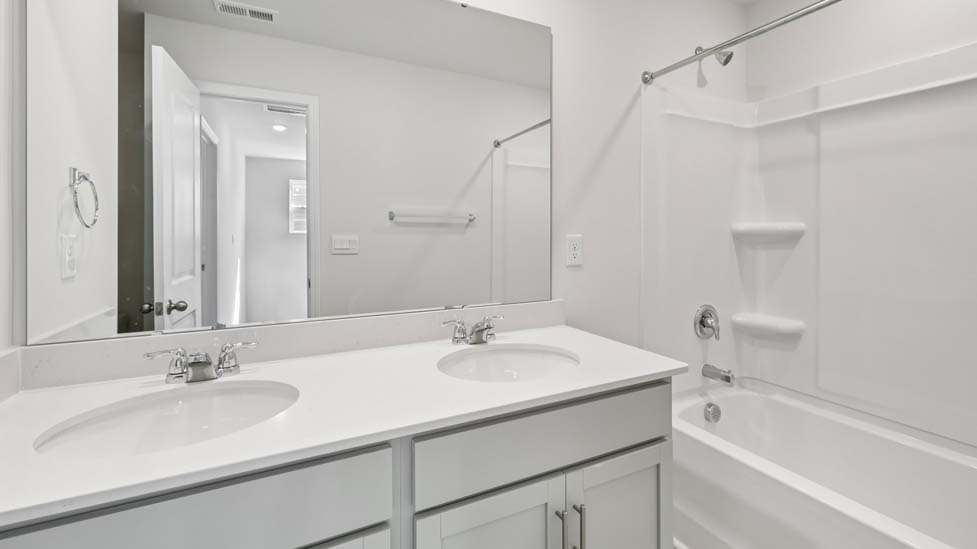 Bathroom with bathtub shower combo