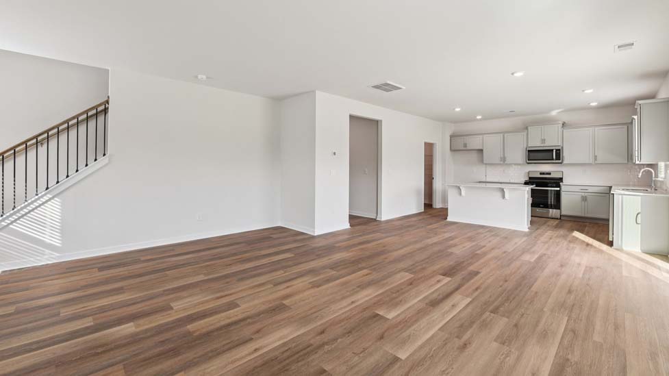 Living room area with fireplace and windows
