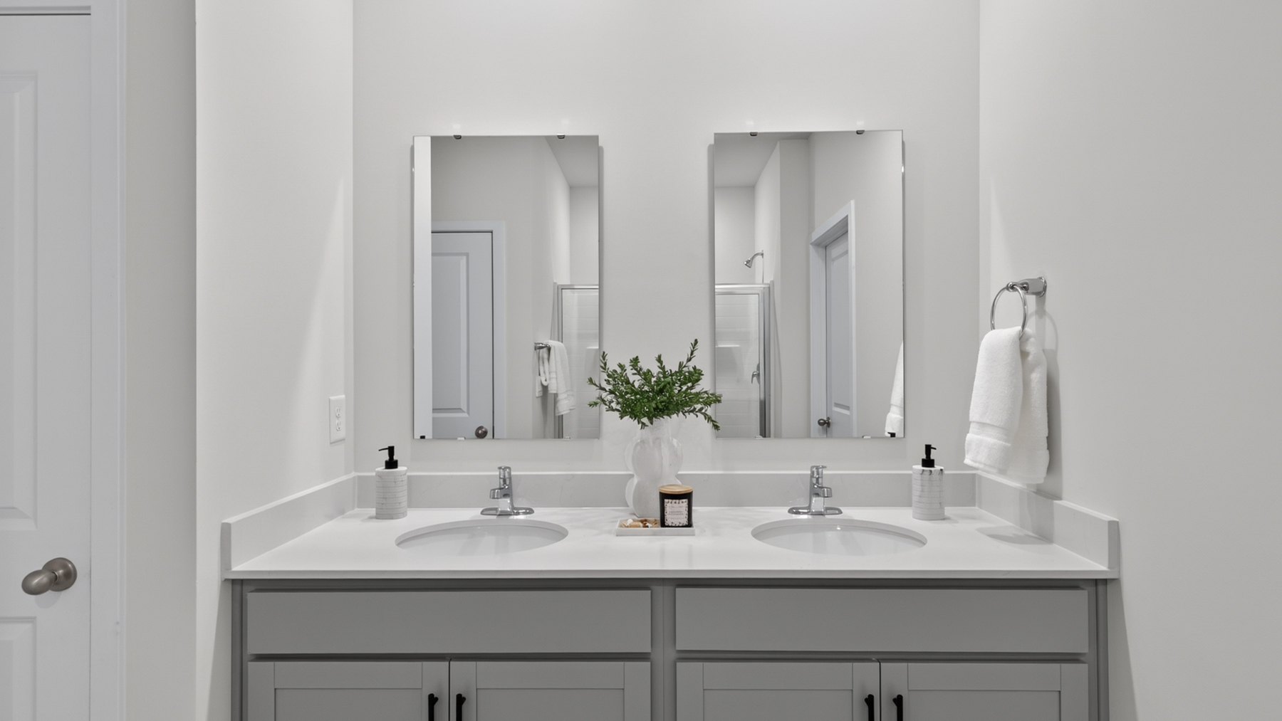Primary bathroom with bathtub and standing glass door shower