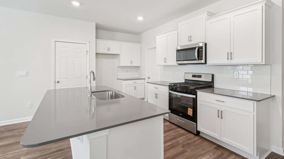 Kitchen and island with stainless steel applainces