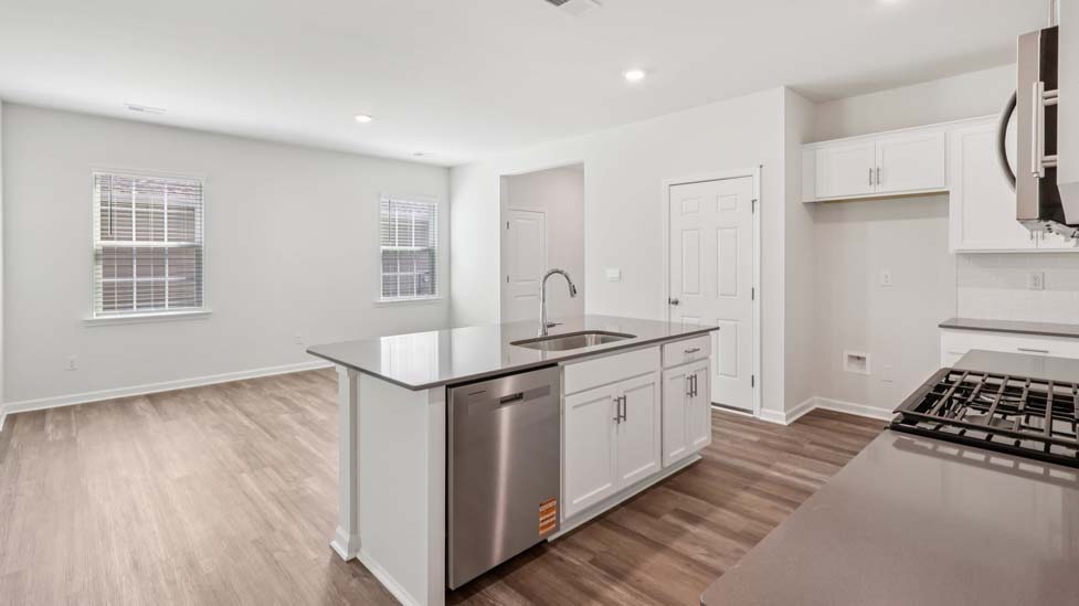 Kitchen and island with stainless steel applainces