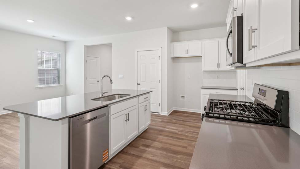 Kitchen and island with stainless steel applainces