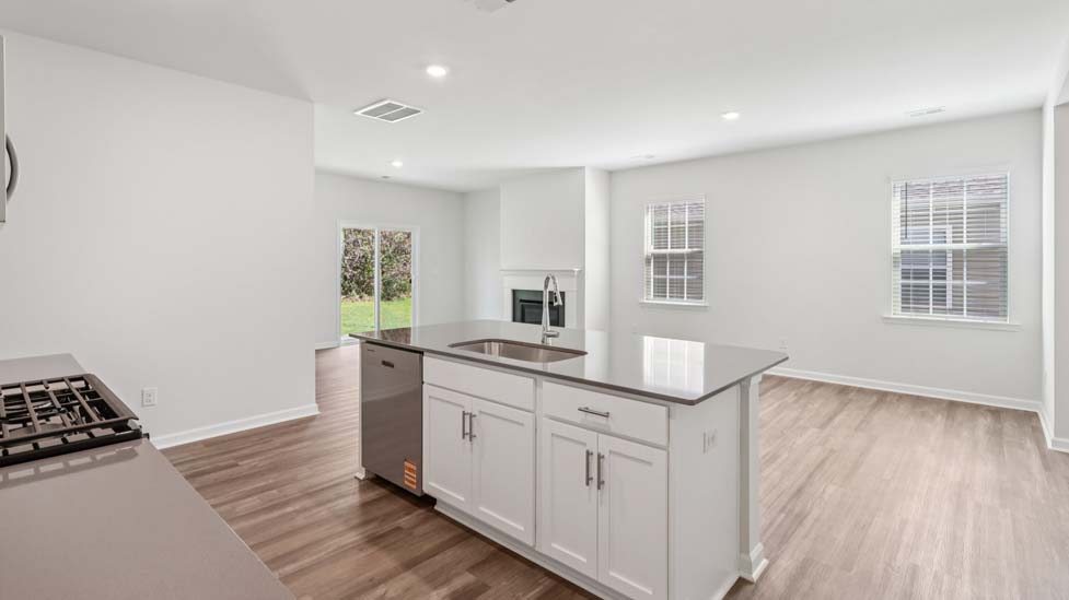 Kitchen and island with stainless steel applainces