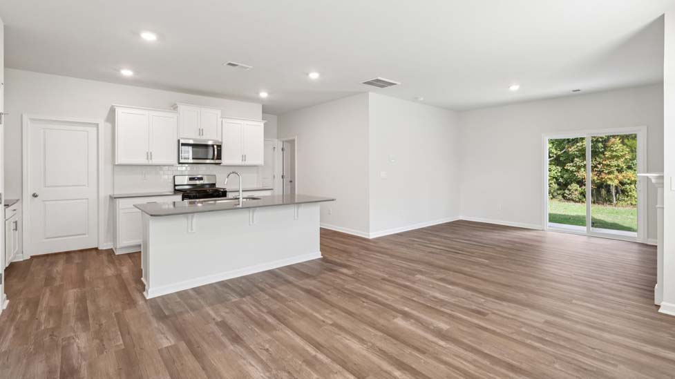 Kitchen and island with stainless steel applainces
