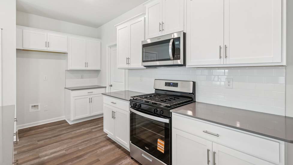 Kitchen and island with stainless steel applainces