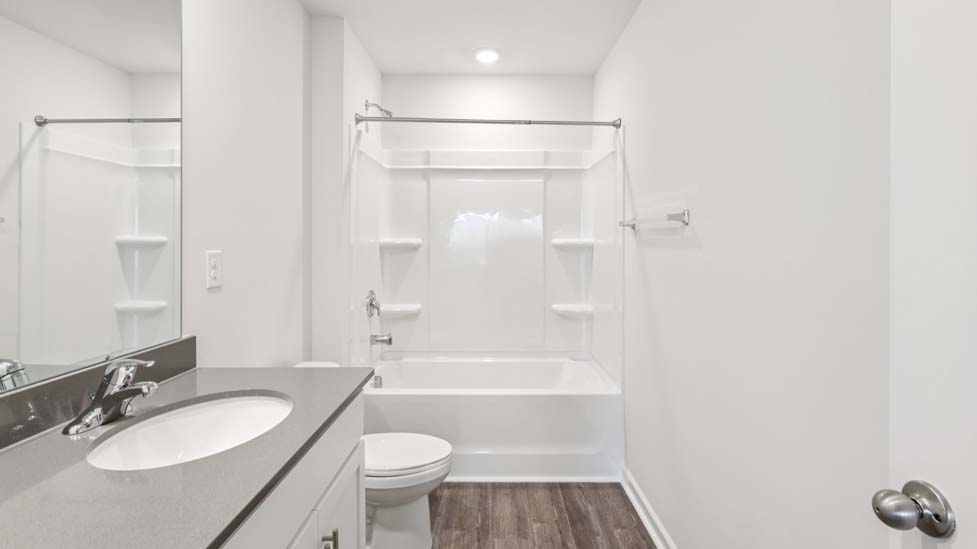 bathroom with shower tub combination