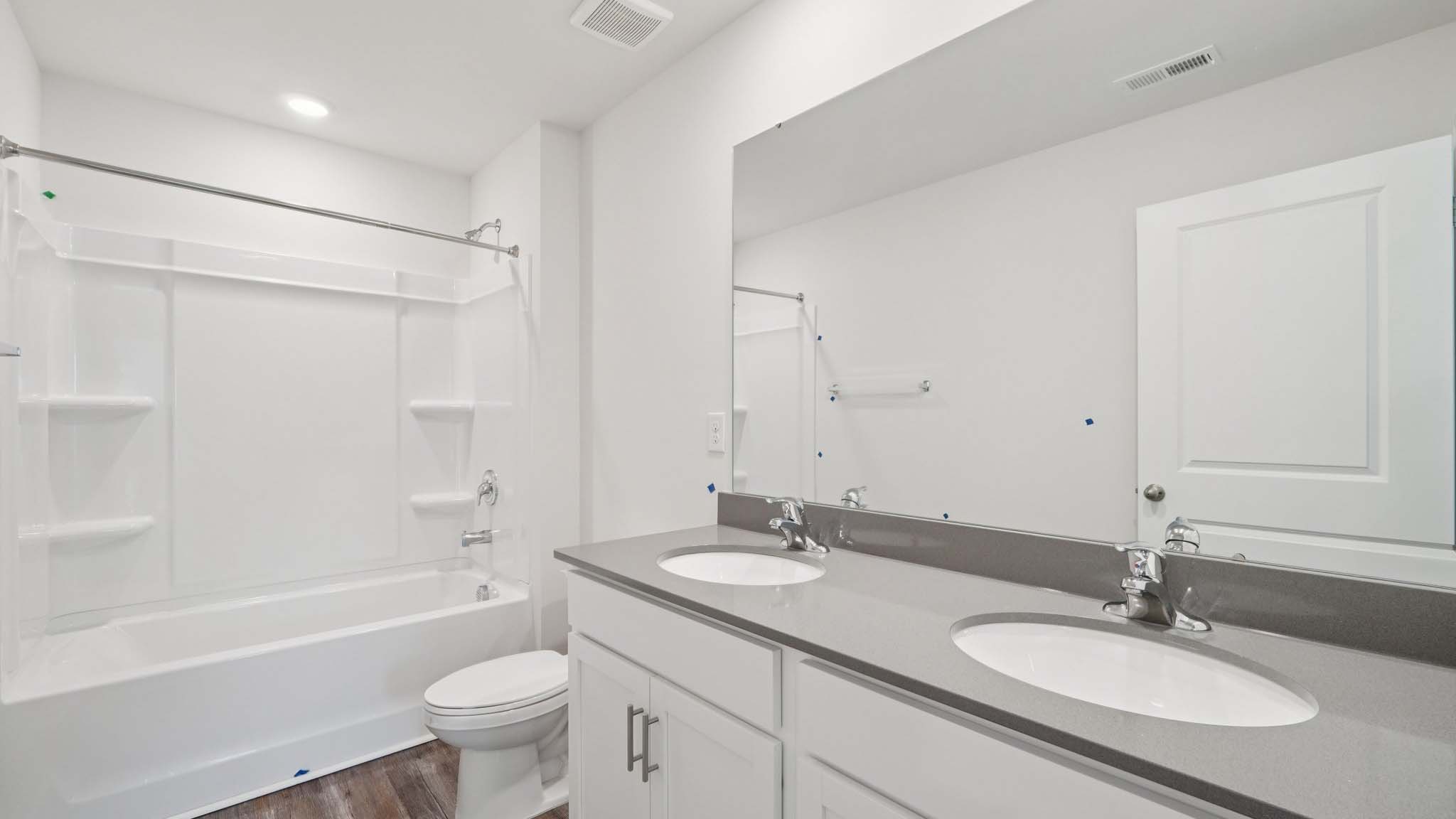 bathroom with shower tub combination