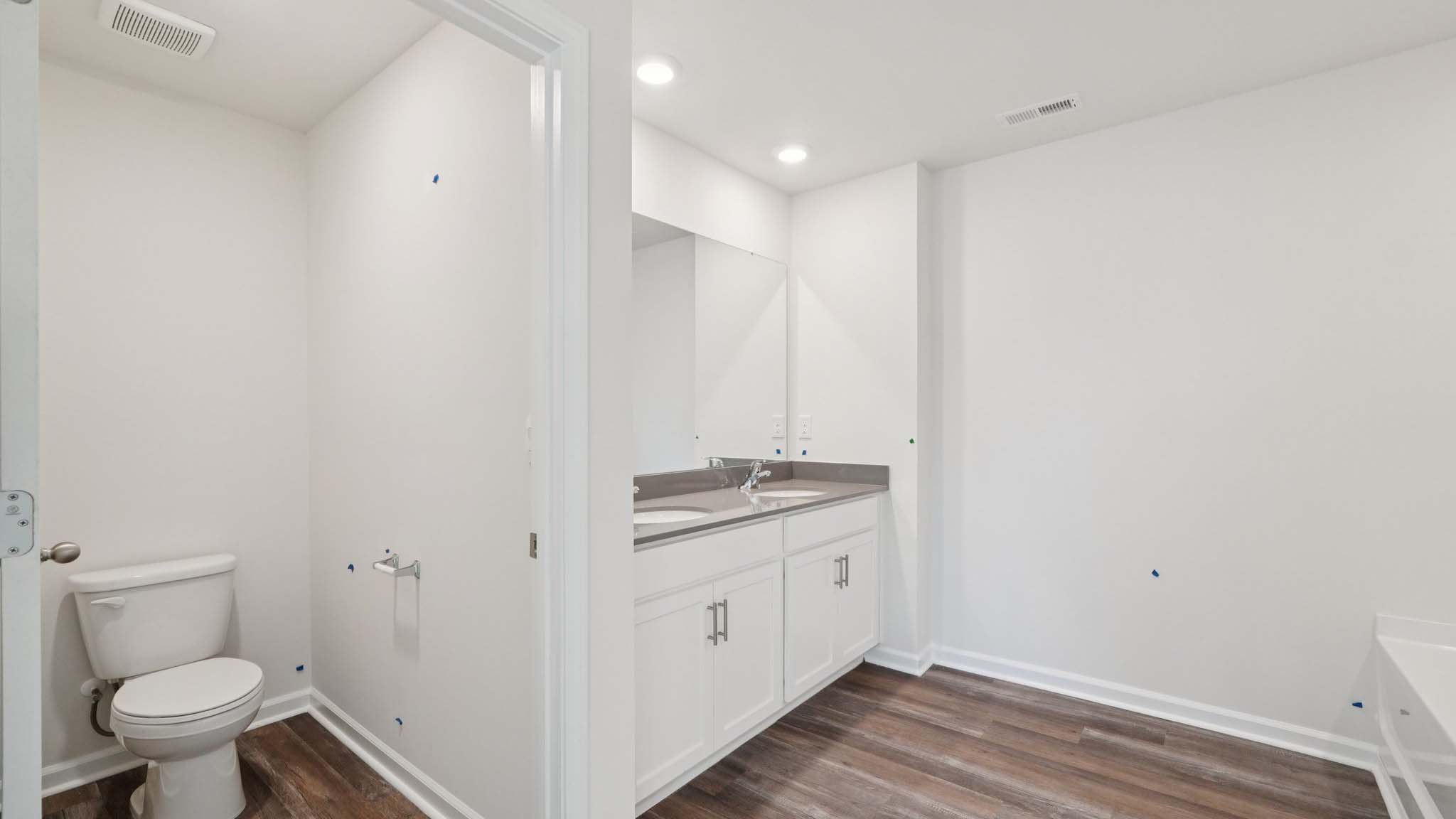 Primary bathroom with standing glass shower