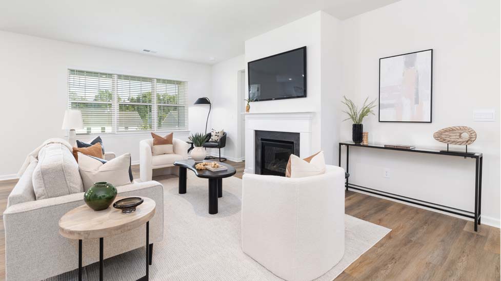 Open family room with large windows, and fireplace