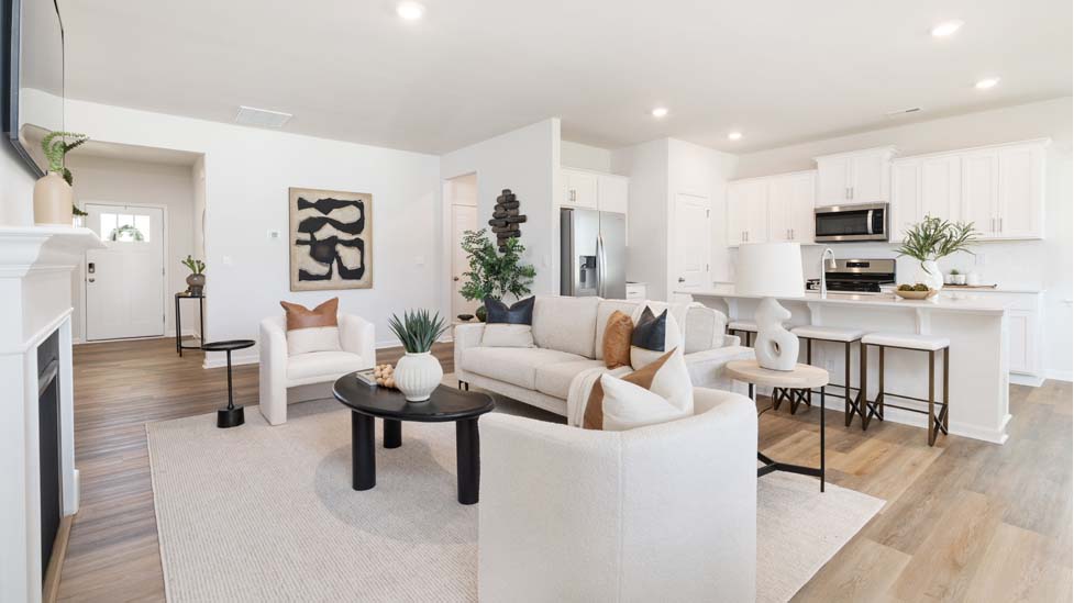 Open family room with large windows, and fireplace