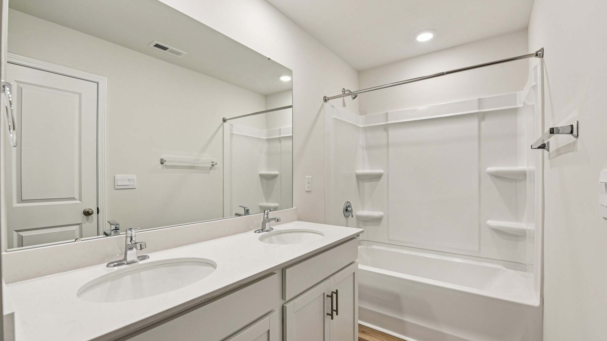 Bathroom with bathtub shower combo