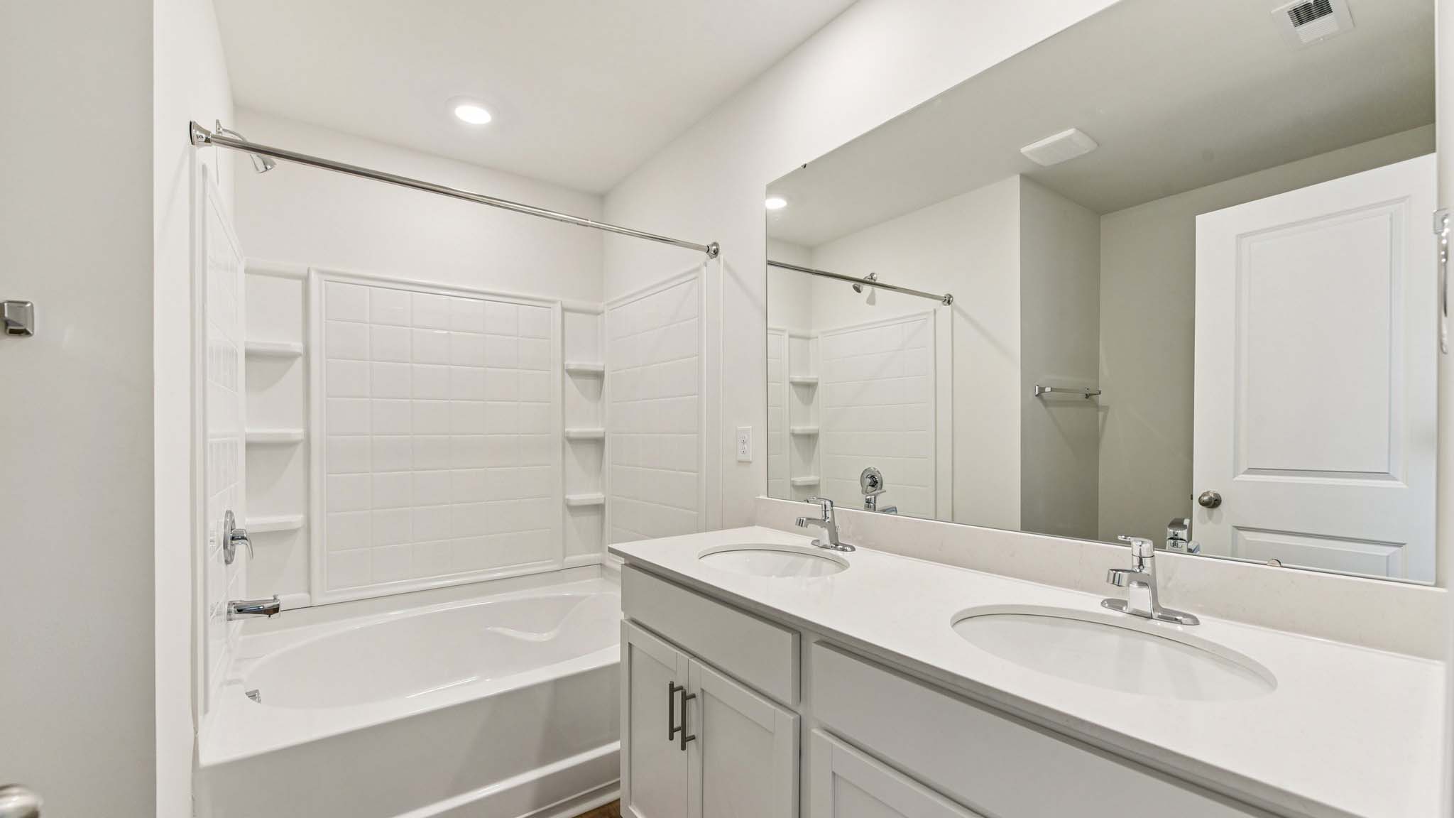 Bathroom with bathtub shower combo