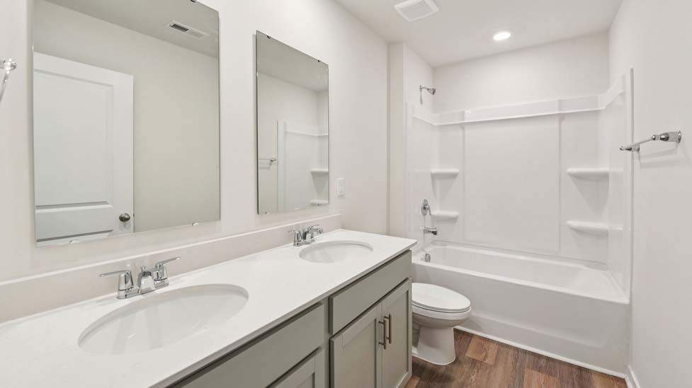 Bathroom with bathtub shower combo