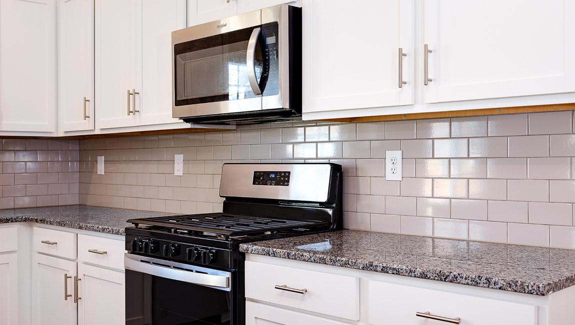 Kitchen and breakfast area with sliding glass back door