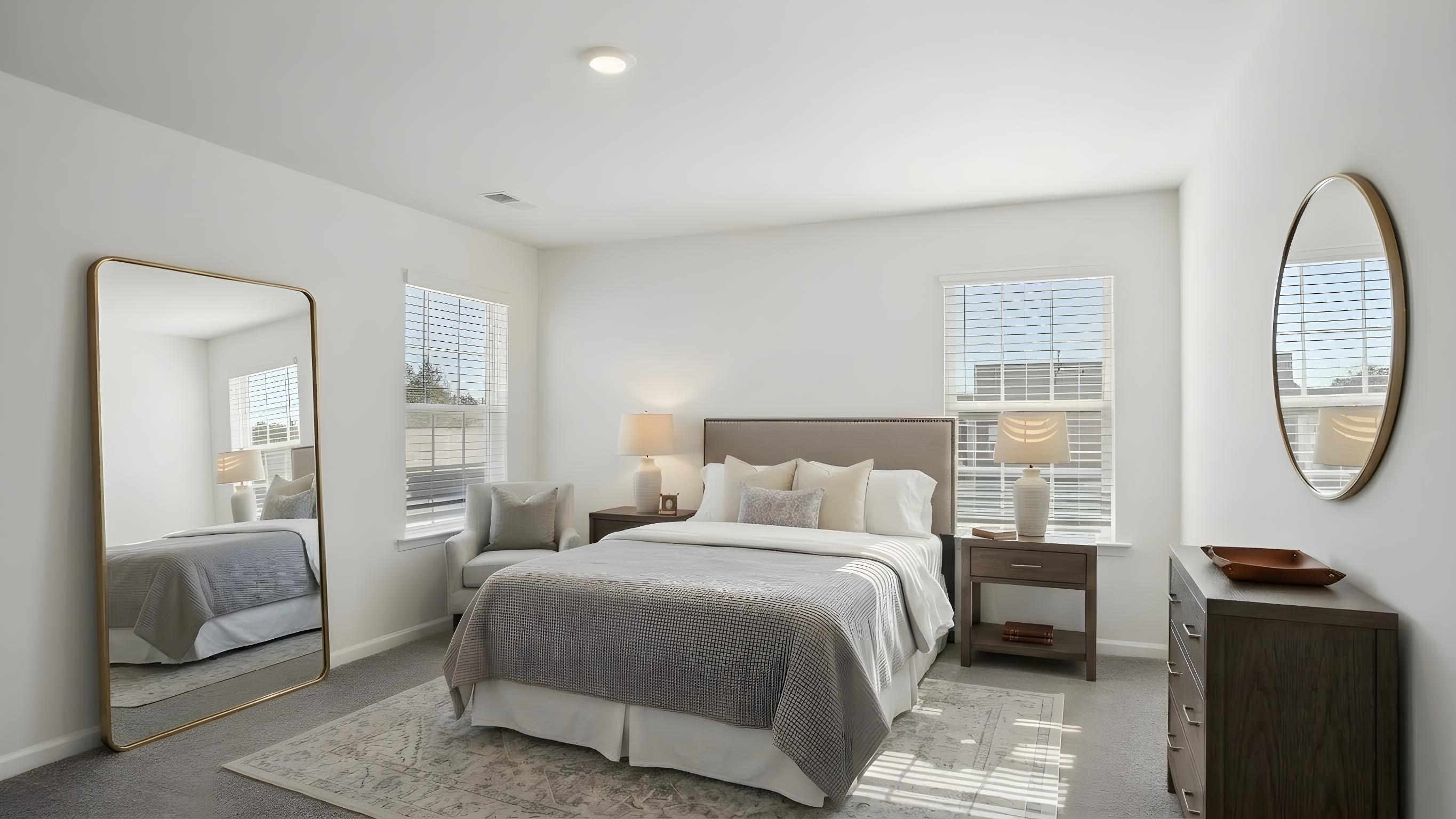 Carpeted bedroom with small windows
