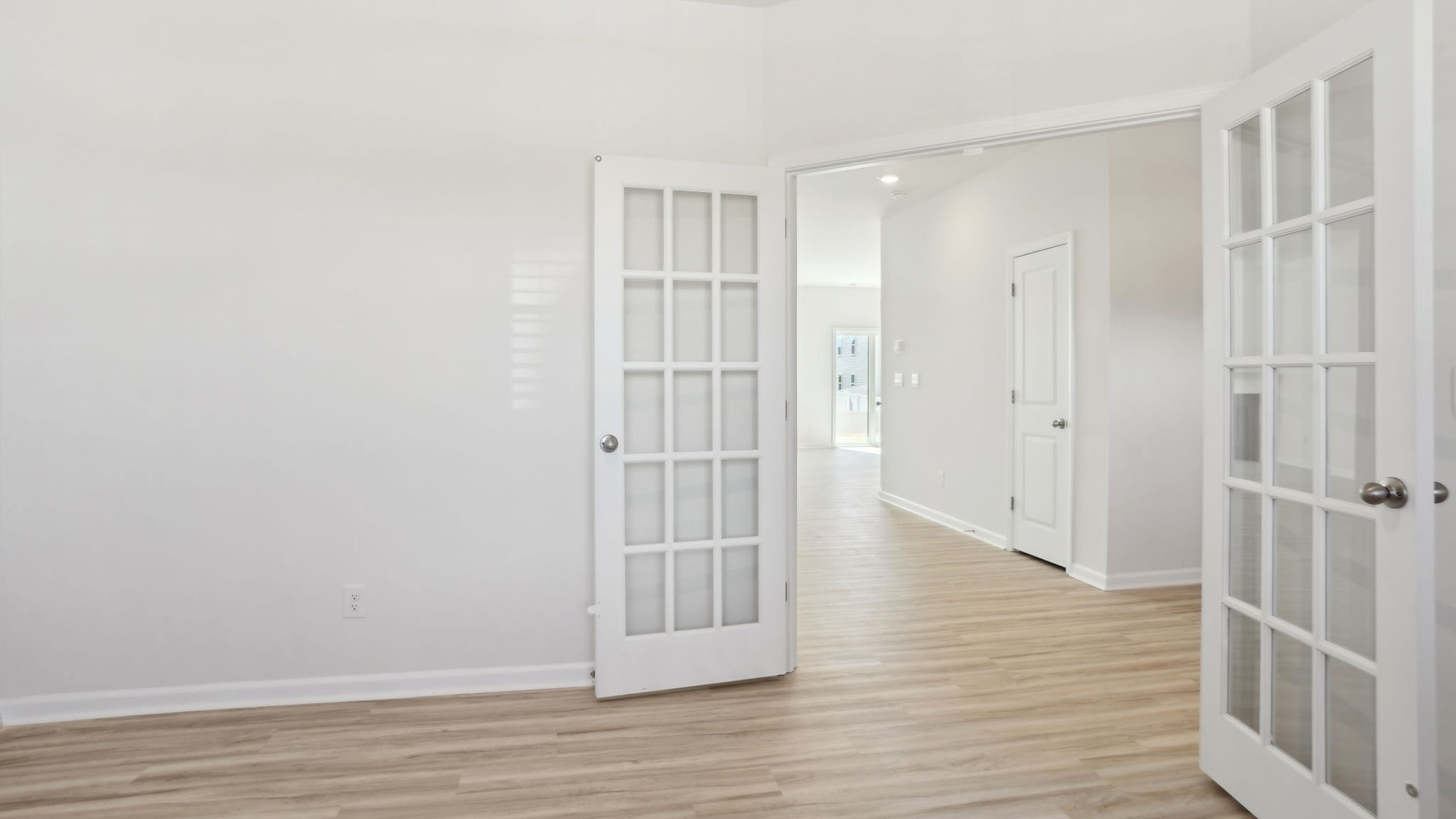 Study with french doors and large window