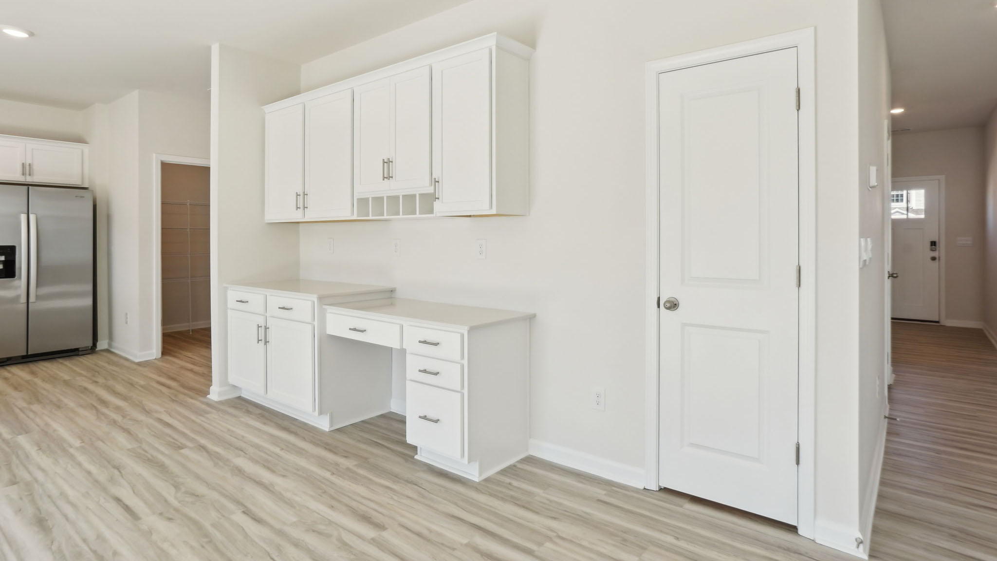 Living room with fireplace and large window