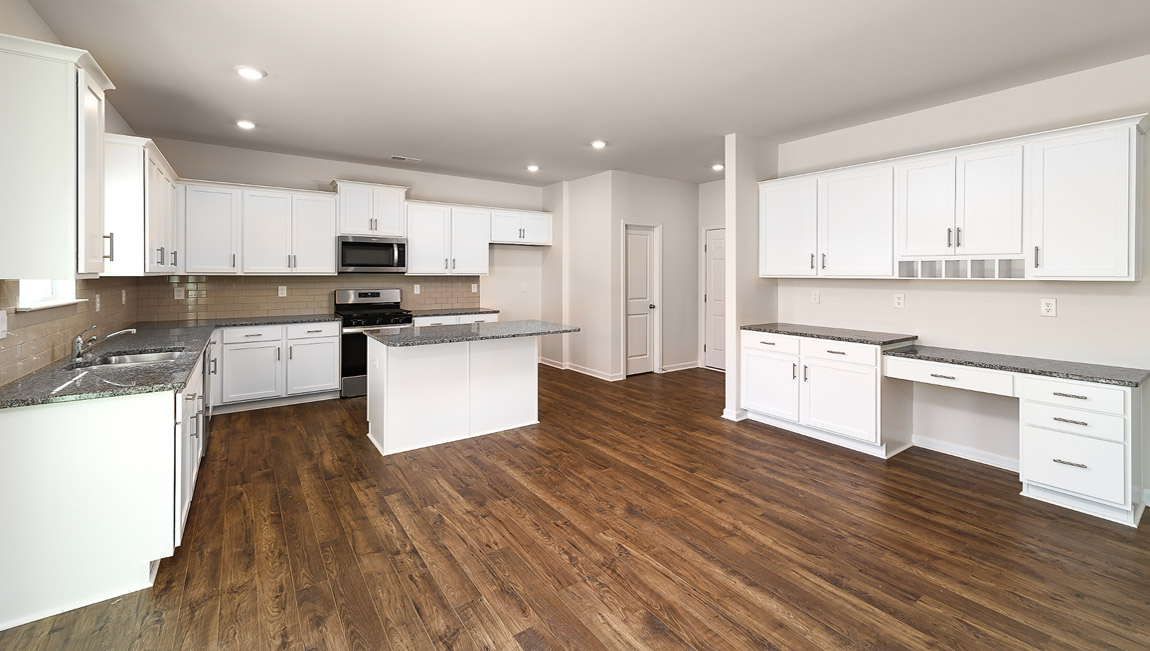 Kitchen and breakfast area with sliding glass back door