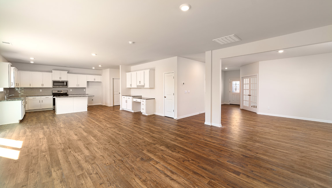 Living room with fireplace and large window