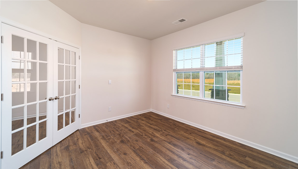 Study with french doors and large window