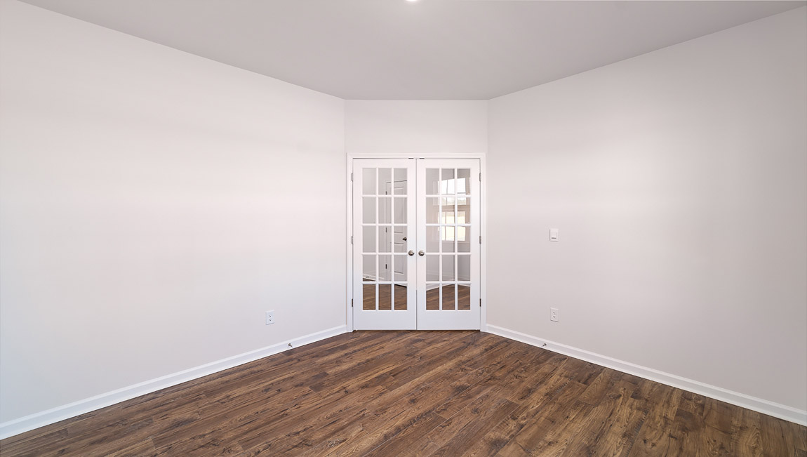 Study with french doors and large window