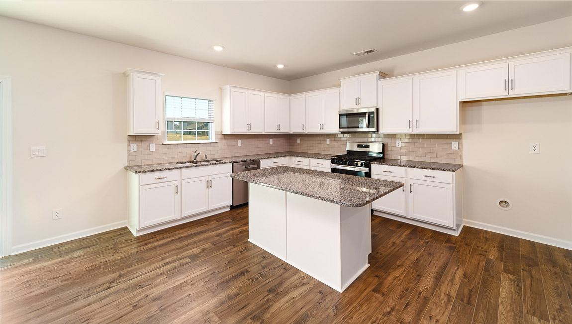 Kitchen and breakfast area with sliding glass back door